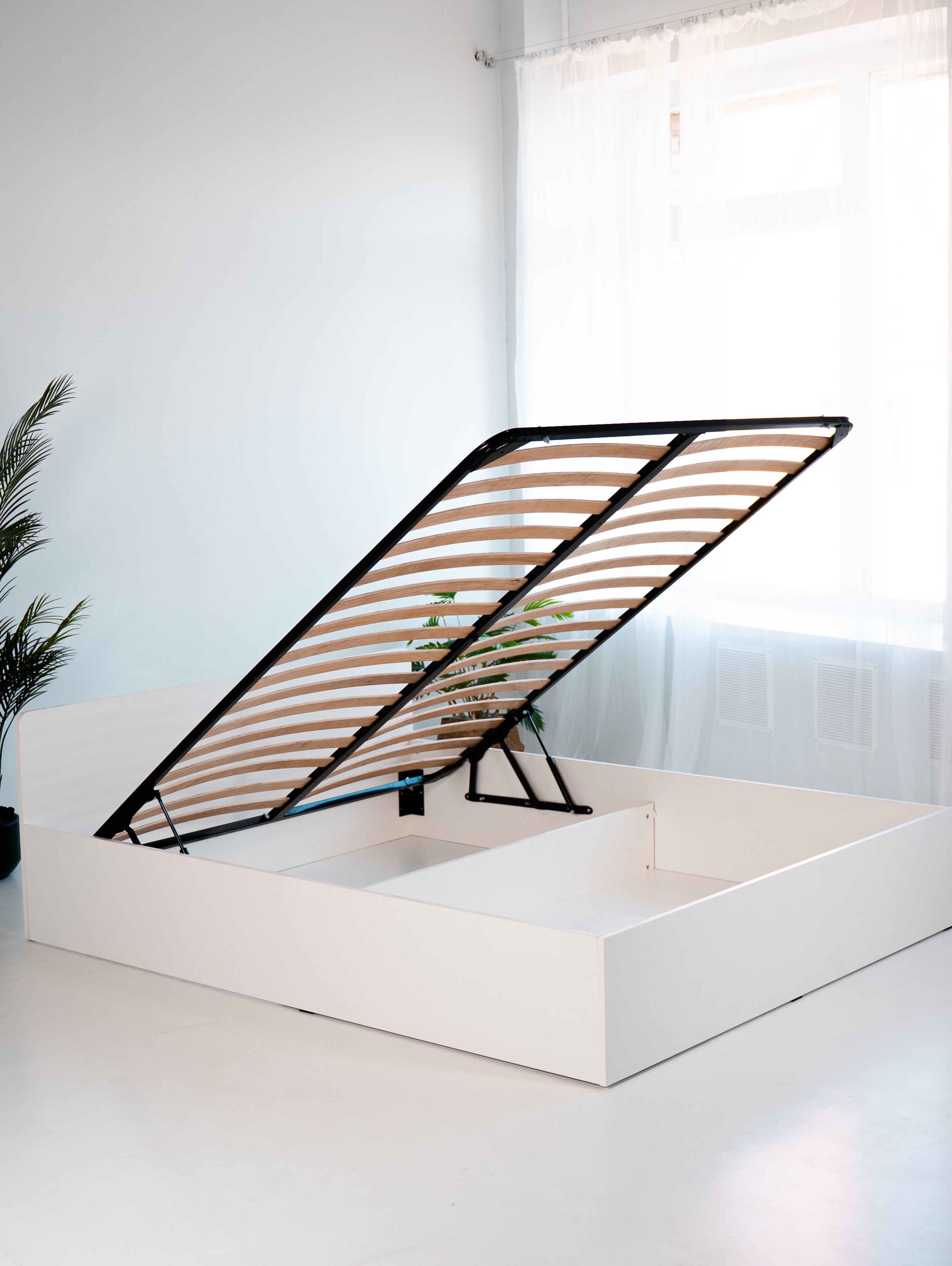 Łóżko 140x200 z podnośnikiem i pojemnikiem na pościel