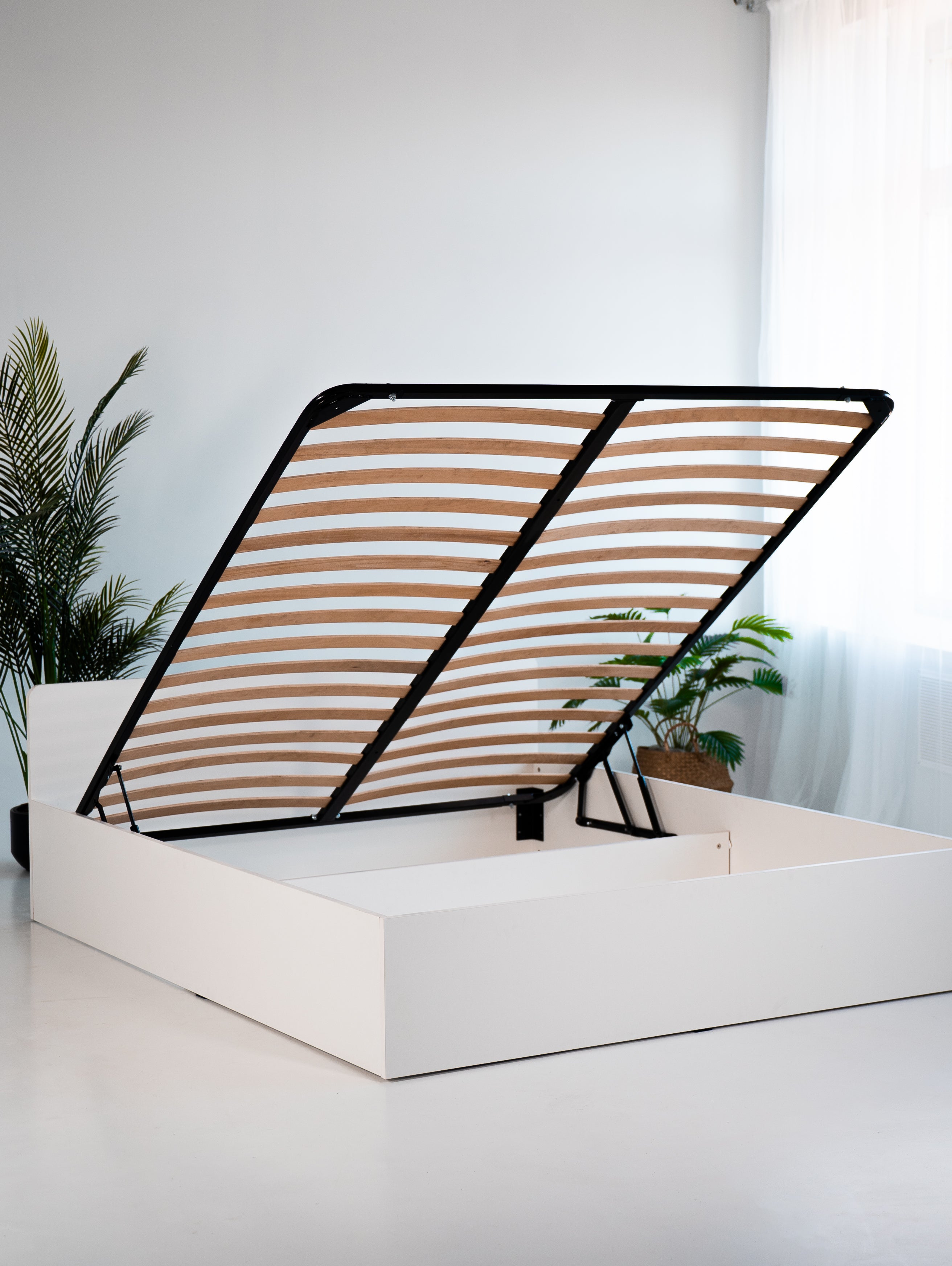 Łóżko 180x200 z podnośnikiem i pojemnikiem na pościel biały