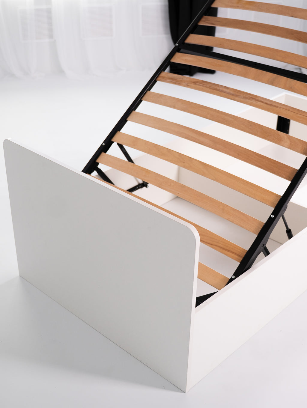 Łóżko 90x200 z podnośnikiem i pojemnikiem na pościel